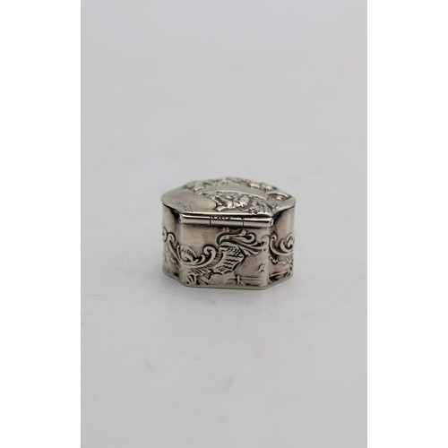 471 - A DUTCH HALLMARK SILVER PILL BOX, the lid embossed with vine harvest scene, with intricate embossed ... 