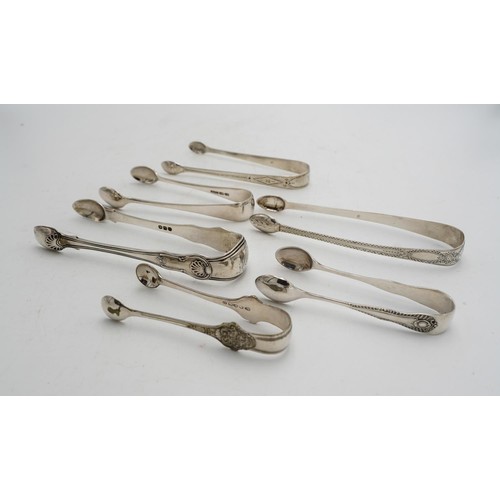 474 - FOUR PAIRS OF ENGLISH SILVER SUGAR TONGSVARIOUS MAKERS AND DATES5.1 troy ozs.159 grams together with... 