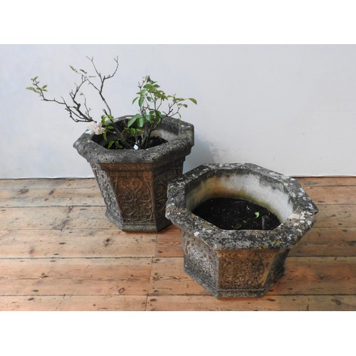 113 - TWO WEATHERED RECONSTITUTED STONE OCTAGONAL GARDEN PLANTERS