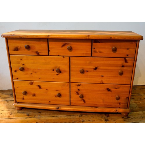 74 - MODERN PINE MERCHANT'S STYLE CHEST OF SEVEN DRAWERS, 81 x 122 x 40cms