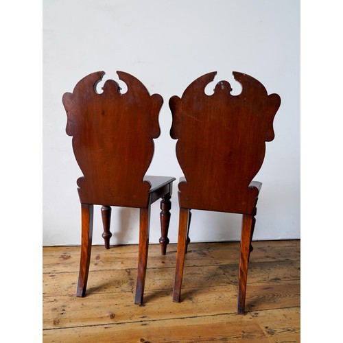 78 - A PAIR OF VICTORIAN MAHOGANY HALL CHAIRS AND A PIANO STOOL, the chairs measuring 88 x 44cms