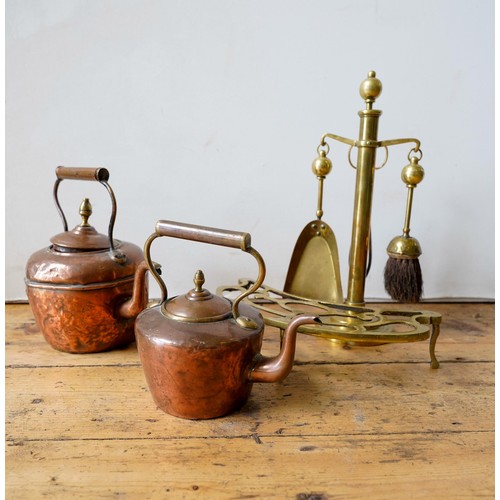 81 - TWO VICTORIAN COPPER KETTLES, BRASS COMPANION SET AND TRIVET