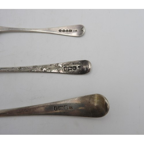 487 - A GEORGIAN HALL MARK SILVER BASTING SPOON, AN ORNATE FRUIT DECORATED HALLMARK SILVER SERVING SPOON A... 