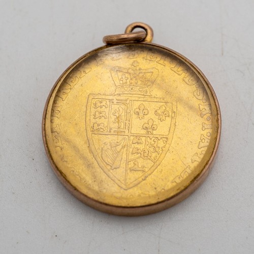 500 - A GEORGIAN GOLD HALF GUINEA COIN, DATED 1787, in bevelled fob mount