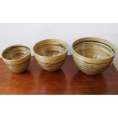 115 - A SET OF THREE CONTEMPORARY GRADUATED LACQUERED BAMBOO PLANTERS, the largest 20cm high x 28cm dia