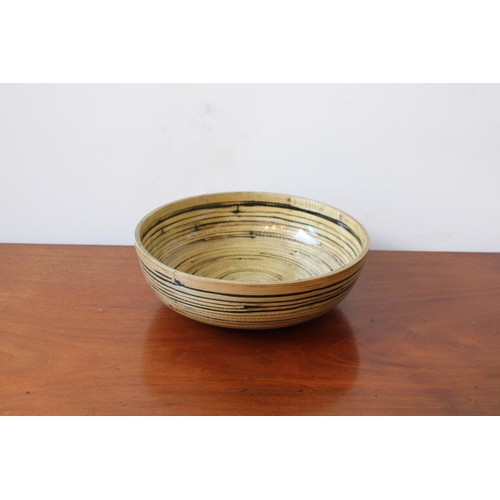 116 - A LACQUERED BAMBOO CIRCULAR BOWL, 10cm high x 30cm dia