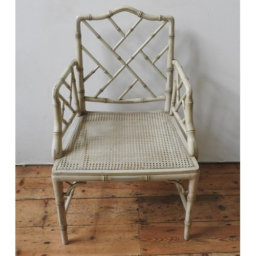 85 - A CREAM PAINTED 'CRACKED ICE' STYLE BAMBOO CHAIR AND TWO OCTAGONAL GLASS TOP BAMBOO TABLES