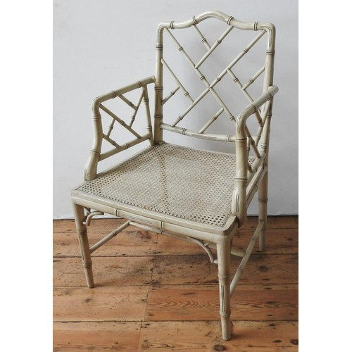 85 - A CREAM PAINTED 'CRACKED ICE' STYLE BAMBOO CHAIR AND TWO OCTAGONAL GLASS TOP BAMBOO TABLES