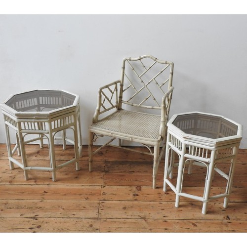 85 - A CREAM PAINTED 'CRACKED ICE' STYLE BAMBOO CHAIR AND TWO OCTAGONAL GLASS TOP BAMBOO TABLES