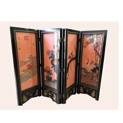 93 - CHINESE BLACK LAQCUER AND GILT DECORATED 20th CENTURY ILLUMINATED FOUR FOLD SCREEN, decorated with e... 