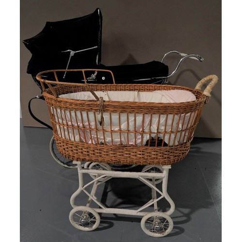 6 - A WILSON 'COACH BUILT' PRAM WITH DARK BLUE LIVERY, curved coach springs and pull-over fabric hood an... 