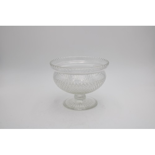 245 - A HEAVY CUT GLASS ROSE BOWL ON SPREADING FOOT BASE, 17cm high, 21cm dia