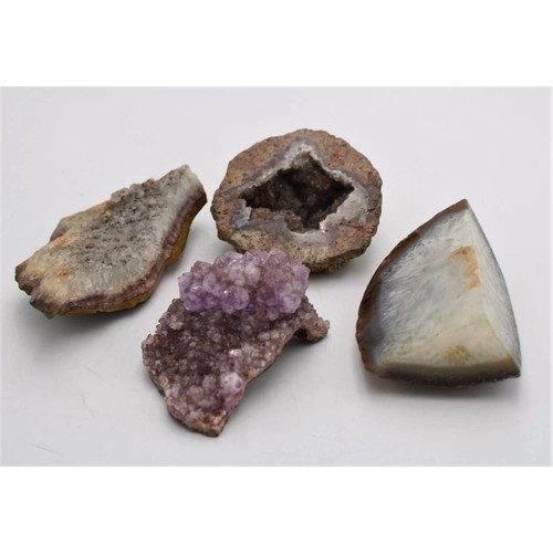 255 - THREE PIECES OF ROCK CRYSTAL INCLUDING AMETHYST CRYSTAL FRAGMENT, AND A WORKED CRYSTAL ORNAMENT