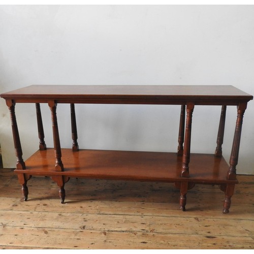 17 - A LATE VICTORIAN MAHOGANY 2-TIER BUFFET, on eight turned legs with eight fluted tapered supporting p... 