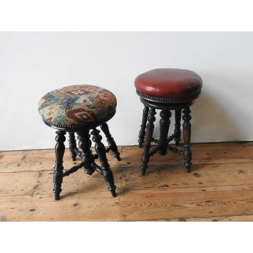 25 - TWO VICTORIAN ADJUSTABLE CIRCULAR PIANO STOOLS, both on ornate turned oak bases, 25cm dia and simila... 