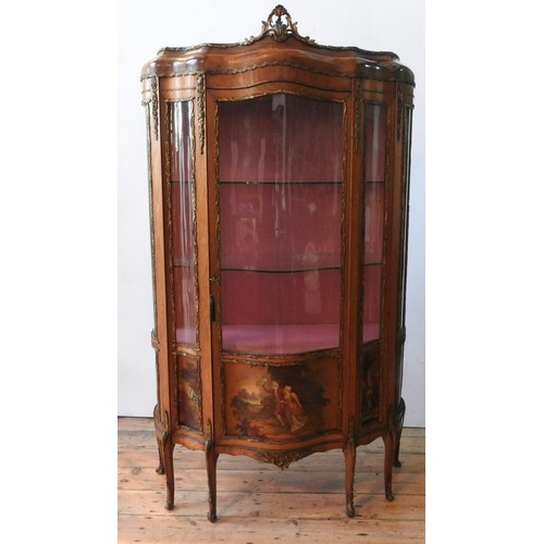 27 - AN ORNATE 20TH CENTURY LOUIS XV STYLE WALNUT VENEER VETRINE CABINET, the serpentine fronted cabinet ... 