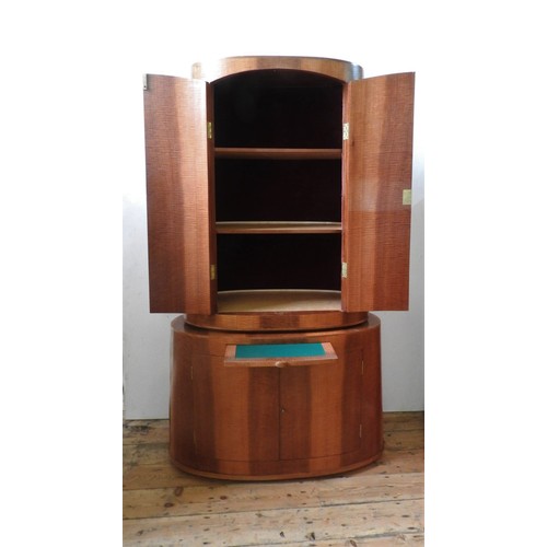 39 - A CONTEMPORARY TWO SECTION COCKTAIL CABINET, ovoid form with fitted drawers to base and shelves to t... 