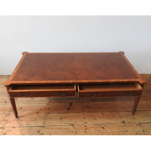 43 - A 20TH CENTURY MAHOGANY CROSS BANDED COFFEE TABLE WITH FOUR DRAWERS, on fluted tapered legs, 46 x 13... 