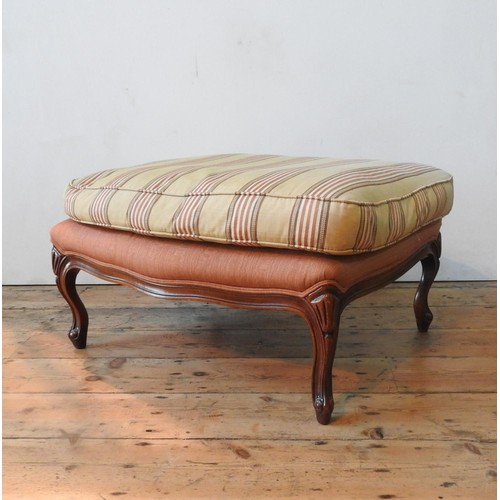 45 - A WADE UPHOLSTERY 'RIMINI' ARMCHAIR AND FOOTSTOOL, both upholstered in gold and burgundy pinstripe p... 