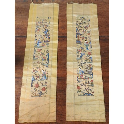 228 - TWO GOLD COLOURED EMBROIDERED ORIENTAL SILK PANELS depicting geishas in pleasure garden, 70 x 19 cm ... 