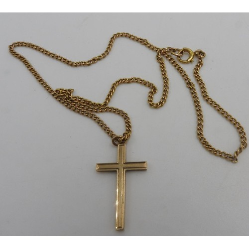 304 - A 9CT CRUCIFIX PENDANT ON 9CT GOLD CHAIN, total weight 7 grams, chain is 42 cm long