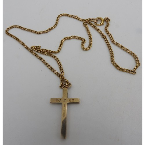 304 - A 9CT CRUCIFIX PENDANT ON 9CT GOLD CHAIN, total weight 7 grams, chain is 42 cm long