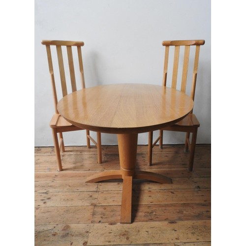 58 - A CONTEMPORARY BEECH WOOD OVAL DINING TABLE AND TWO PAIRS OF HIGH BACK CHAIRS, the oval table top su... 