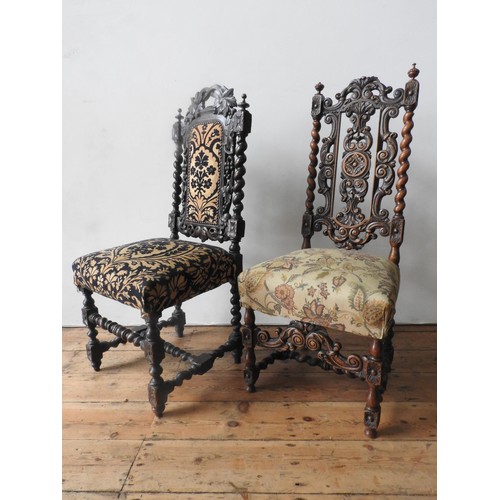 60 - TWO ORNATE CARVED OAK 19TH CENTURY HALL CHAIRS, both with  barley twist and foliate carved frames an... 