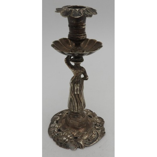 316 - A DUTCH SILVER FIGURINE DECORATED CANDLESTICK, on circular base with pierced floriform detail, the s... 