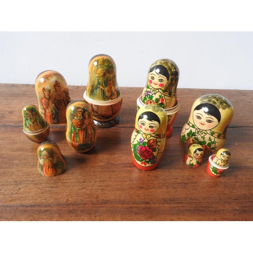 277 - TWO SETS OF STACKING GRADUATED RUSSIAN DOLLS, ten dolls in each set, one set in traditional doll des... 