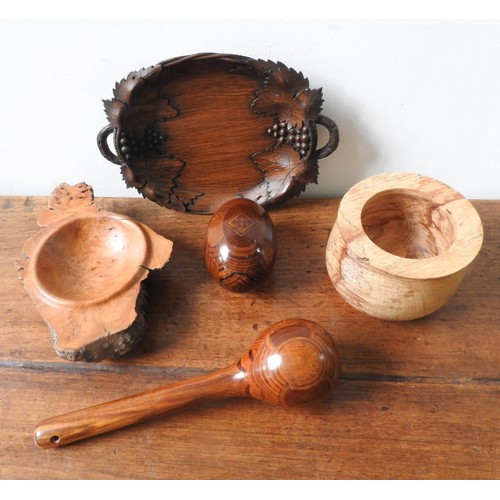 281 - A COLLECTION OF FIVE TREEN ITEMS, including an ornate turned club and egg ornament, two turned bowls... 