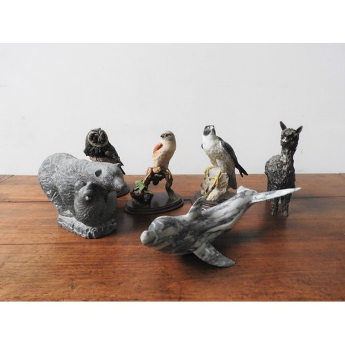 284 - A MARBLE DOLPHIN FIGURE, SOAPSTONE BEAR AND THREE RESIN BIRD ORNAMENTS, and a resin Llama figure, th... 