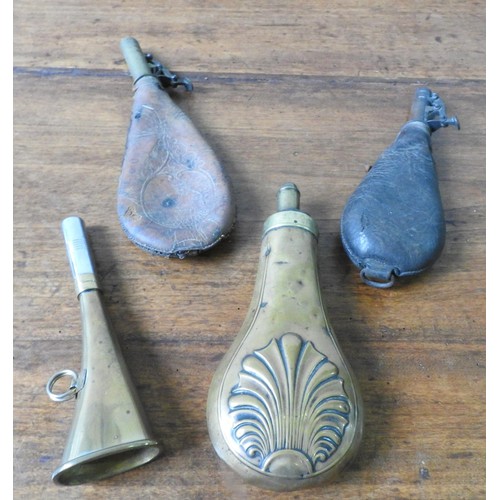 237 - A 19TH CENTURY BRASS SHOT FLASK, TWO LEATHER SHOT FLASKS AND A 20TH CENTURY HUNTING HORN, the brass ... 