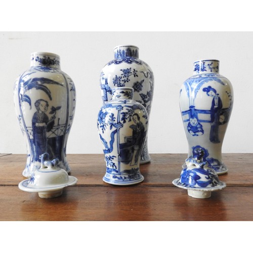 226 - FOUR VARIOUS BLUE AND WHITE ORIENTAL VASES, 24 cm high and smaller