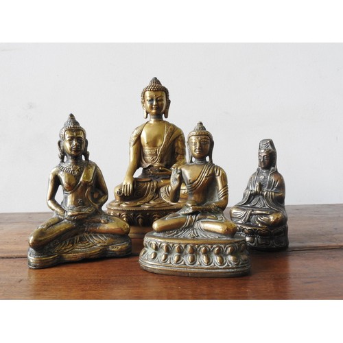 216 - FOUR CAST BRONZE SEATED BUDDHA FIGURES, 20 cm high and three smaller