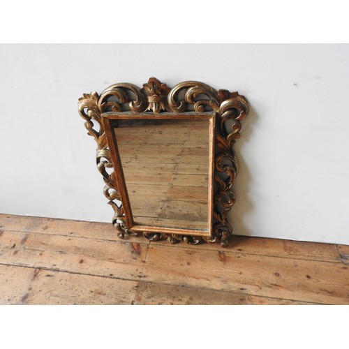 67 - 19TH CENTURY GILTWOOD FRAMED ROCCOCO MIRROR, 64 x 54 cm