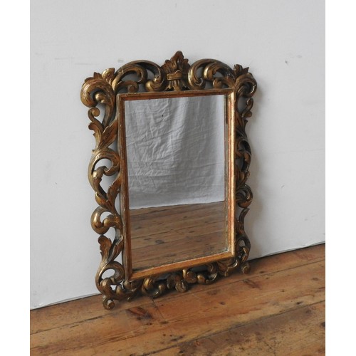 67 - 19TH CENTURY GILTWOOD FRAMED ROCCOCO MIRROR, 64 x 54 cm