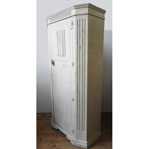 71 - A 20TH CENTURY CREAM PAINTED NARROW WARDROBE, with linen fold detail and canted corners, 186 x 96 x ... 