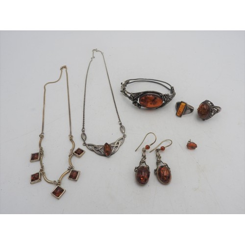 310 - AMBER SET NECKLACES, TWO RINGS AND EARRINGS