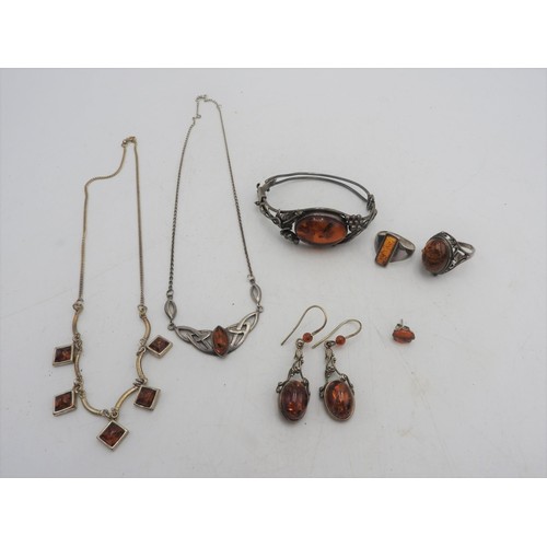 310 - AMBER SET NECKLACES, TWO RINGS AND EARRINGS