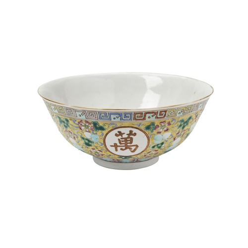 76 - FAMILLE ROSE YELLOW-GROUND BOWLGUANGXU SIX CHARACTER MARK AND OF THE PERIODthe exterior painted with... 