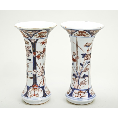 282 - PAIR OF JAPANESE IMARI TRUMPET VASES EDO PERIOD, 18TH CENTURYthe side decorated with verdant fenced ... 