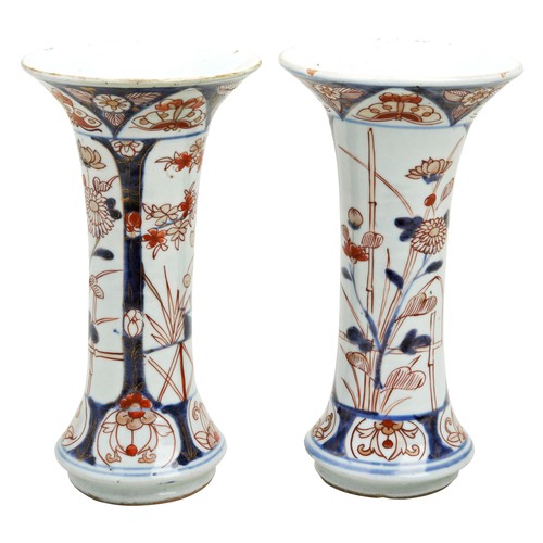 282 - PAIR OF JAPANESE IMARI TRUMPET VASES EDO PERIOD, 18TH CENTURYthe side decorated with verdant fenced ... 