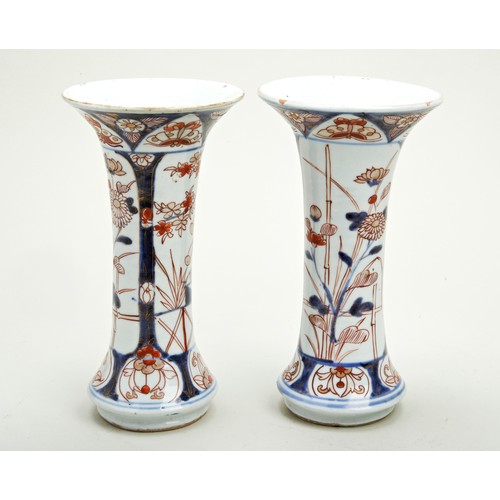 282 - PAIR OF JAPANESE IMARI TRUMPET VASES EDO PERIOD, 18TH CENTURYthe side decorated with verdant fenced ... 