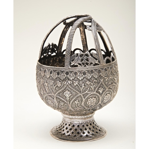 334 - PERSIAN SILVER BASKET19TH CENTURYthe sides finely chased and embossed with enclosed flower scrolls, ... 