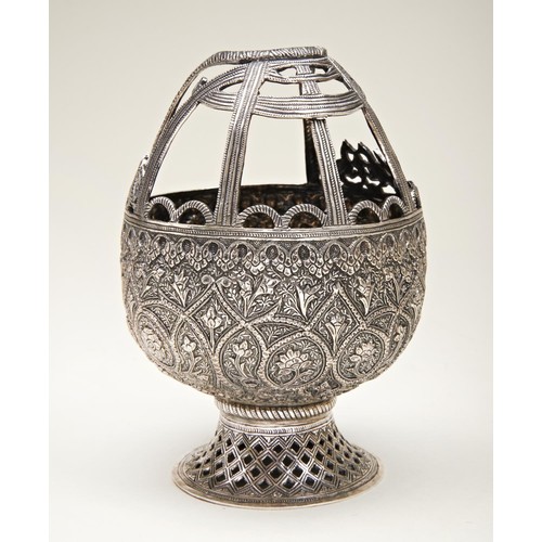 334 - PERSIAN SILVER BASKET19TH CENTURYthe sides finely chased and embossed with enclosed flower scrolls, ... 