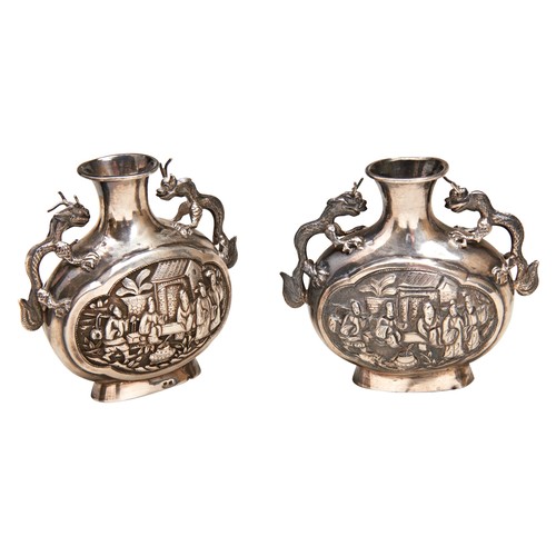 211 - PAIR OF SMALL CHINESE SILVER EXPORT VASESWANG HING, HONG KONG, LATE 19TH CENTURYthe compressed balus... 