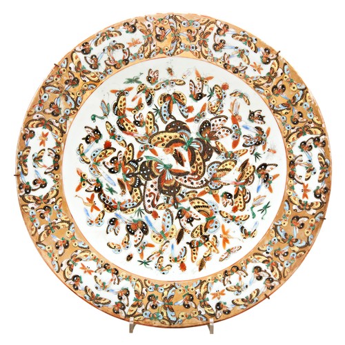 84 - FAMILLE ROSE '100-BUTTERFLIES' CELADON GROUND CHARGERQING DYNASTY, 19TH CENTURYpainted throughout in... 