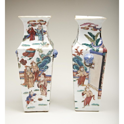 86 - PAIR OF SQUARE-FORM FAMILLE ROSE VASESQING DYNASTY, 19TH CENTURYthe sides painted with interior and ... 