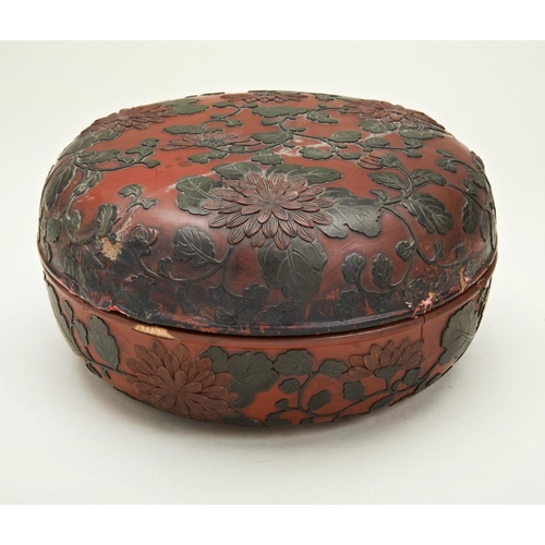 217 - CINNABAR POLYCHROME LACQUER BOXQING DYNASTY, 19TH CENTURYcarved in low relief with blossoming chrysa... 